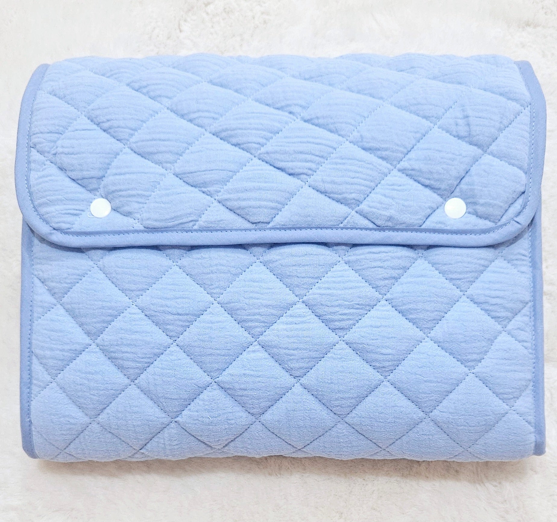 Tapis à langer nomade bleu ciel