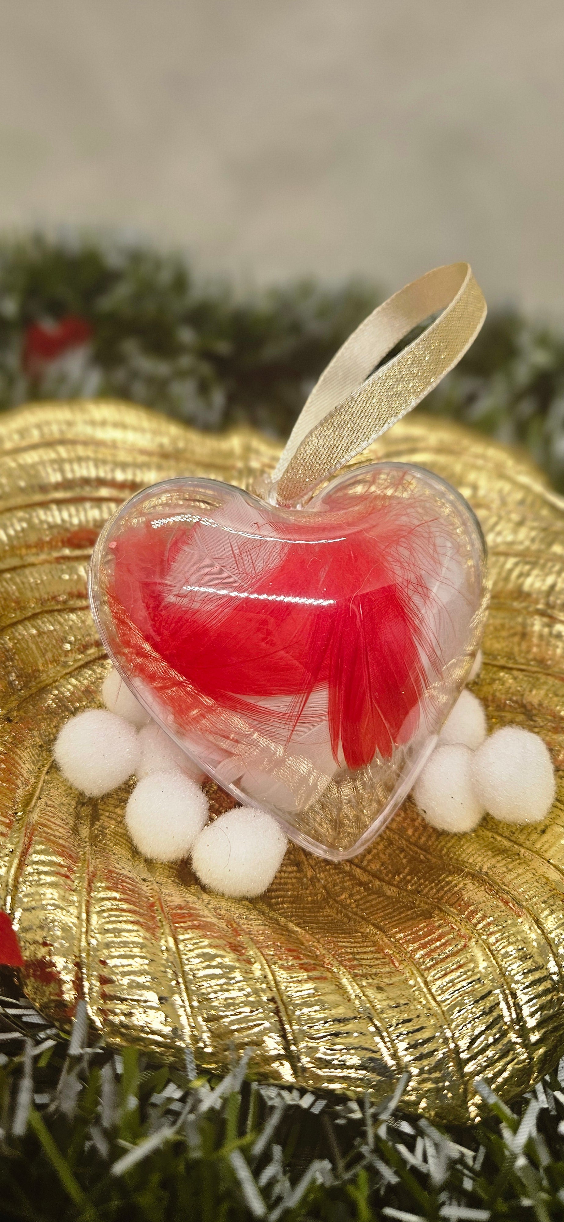 Boule coeur plume rouge