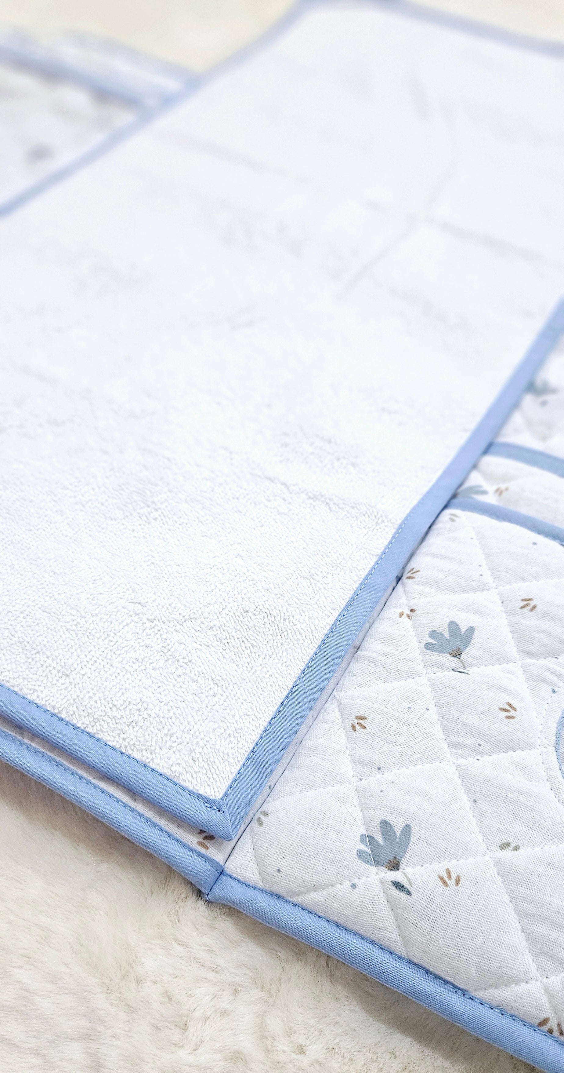 Tapis à langer nomade bleu ciel